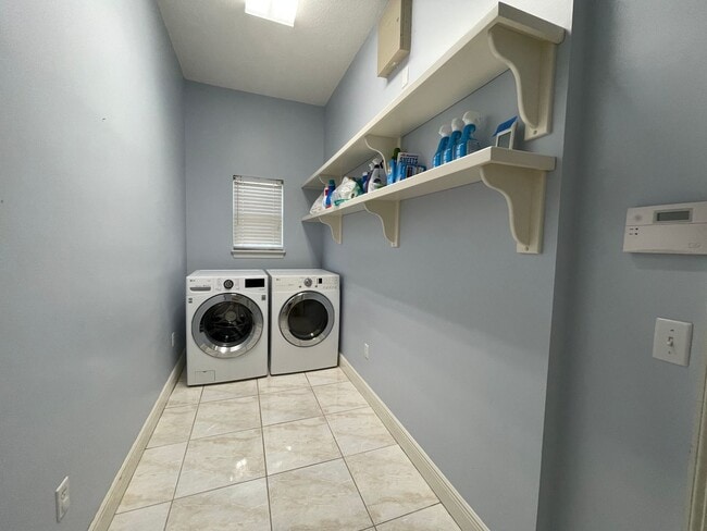 Building Photo - For Lease - 3 BR|2.5 BA w/ In-ground Pool in Palm Bay!