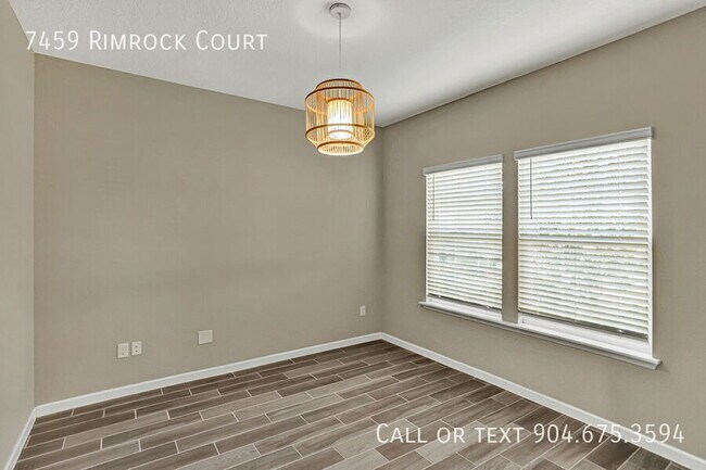 Building Photo - 7459 Rimrock Ct