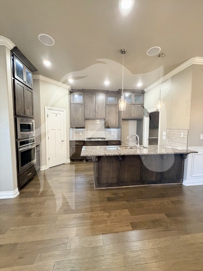 Building Photo - "Stunning 4-Bed Gem with Granite Touch & C...