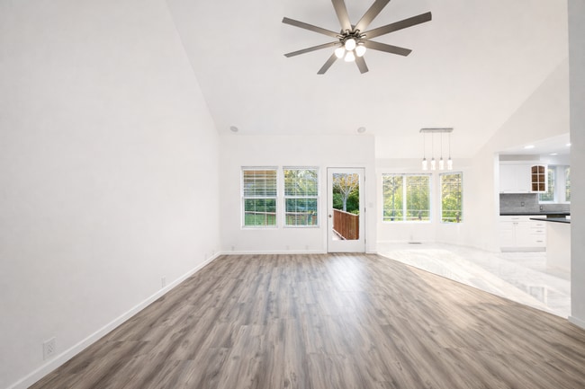 Building Photo - Executive 3 Bed Home with 3 Car Garage & Private Fenced Yard