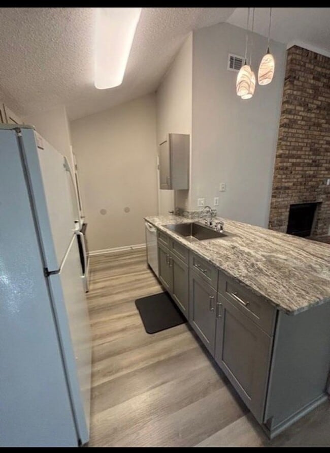 Building Photo - Affordable Living with Comfort & Convenience