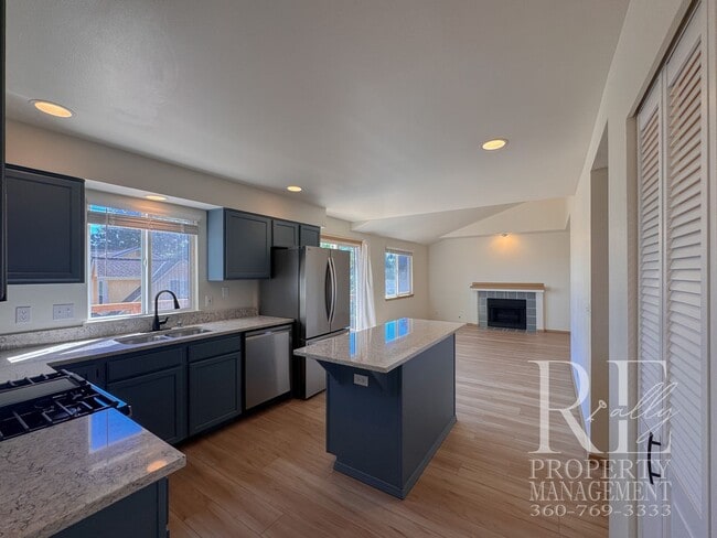 Building Photo - Immaculate Bremerton Home with Expansive Yard, Multiple Living Areas & Designer Kitchen