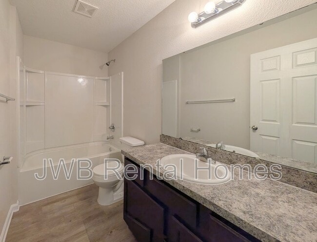 Building Photo - 7804 Playschool Ln