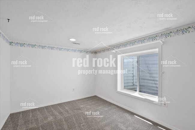 Building Photo - 2211 E 49th Ave