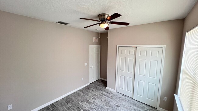 Building Photo - Spacious 3-Bedroom Home with Garage & Pati...