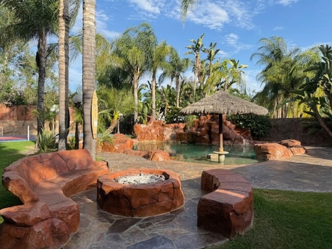Building Photo - Gated estate with a backyard oasis