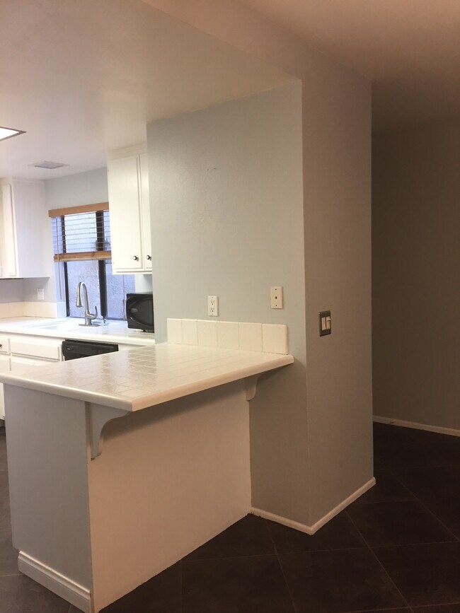 Countertop convenient for 2 barstools great for work space or entertaining - 1073 S Romney Dr