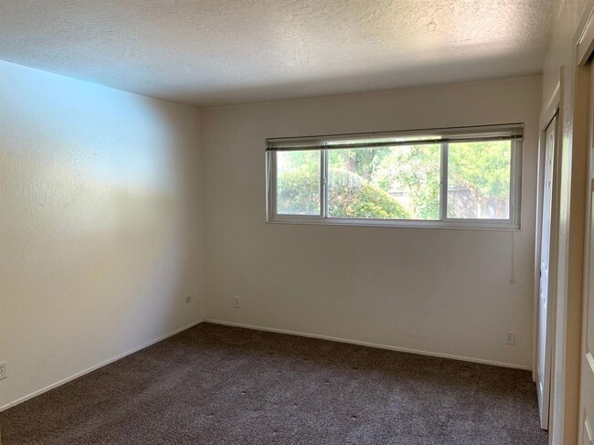 Building Photo - Enjoy the Backyard Pool at This 4-Bedroom ...