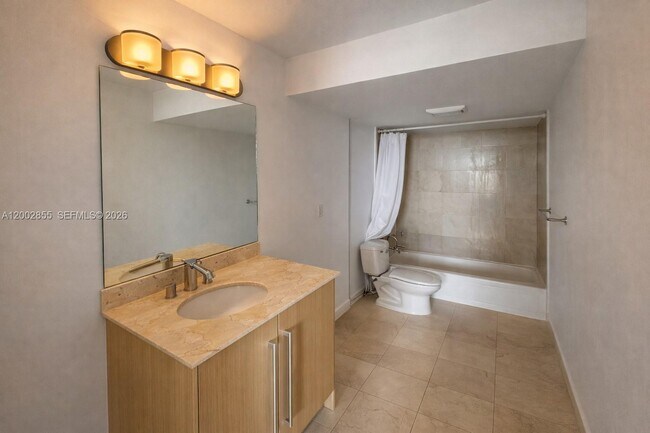 Building Photo - 10275 Collins Ave