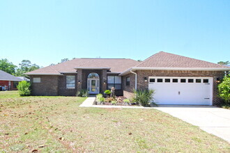 Building Photo - Spacious 3BR/3BA Holley by the Sea Home wi...