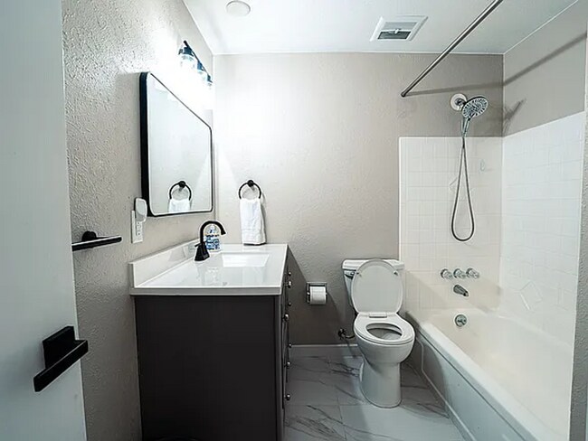 Building Photo - Remodeled 3 bedroom, 3 bath home with addi...