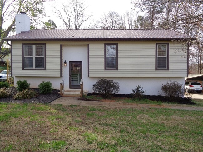 Building Photo - Nice! Updated House with Unfinished Basement