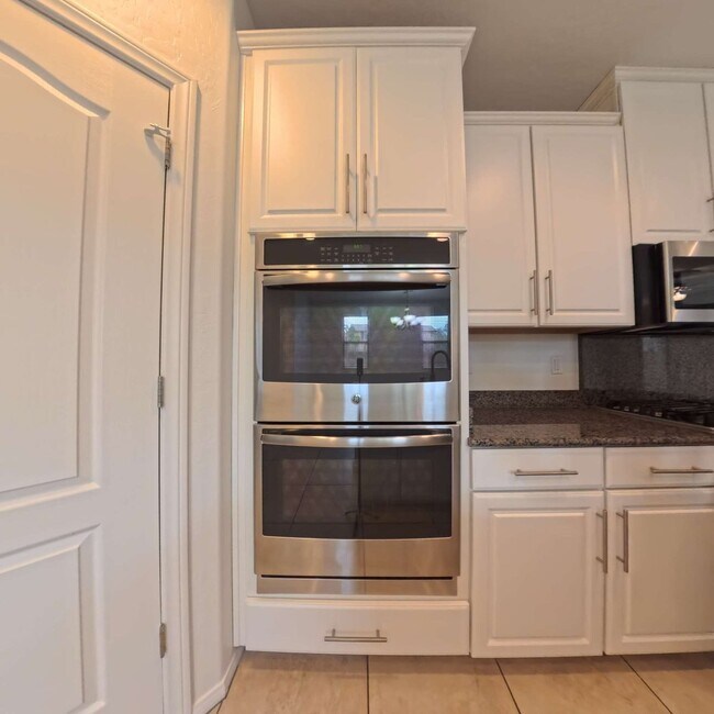 Building Photo - Exceptional Dual Master Residence with Modern Upgrades