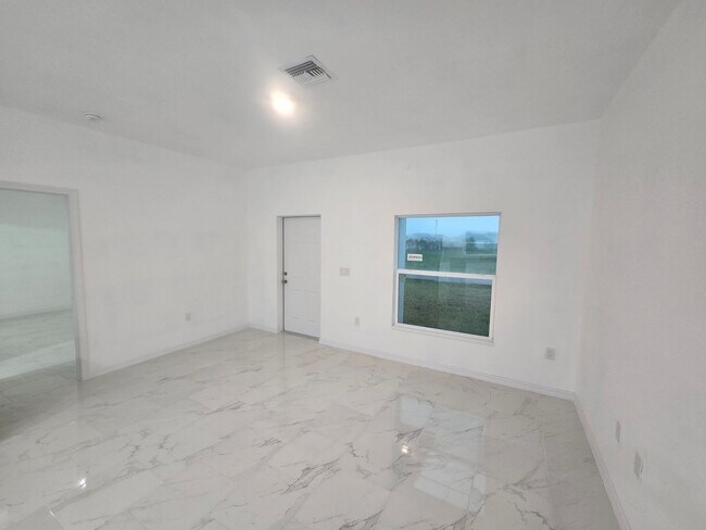 Building Photo - BRAND NEW THREE BEDROOM, 2 BATH, 1 CAR GAR...