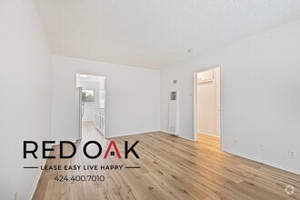 Building Photo - Beautiful and Bright One Bedroom with In-U...