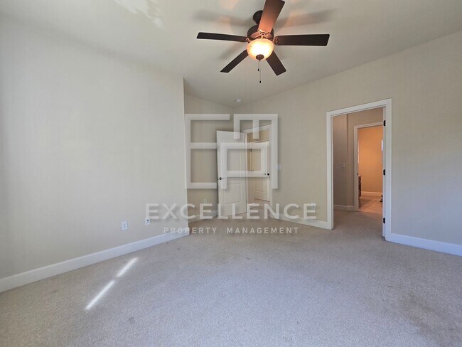 Building Photo - 3/3.5 Townhouse with 2 Car Garage, 2 Maste...