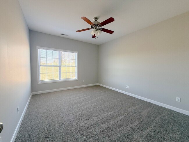 Building Photo - Spacious 4-Bedroom Home with Large Yard and Dual Garages in Cookeville  Property Description