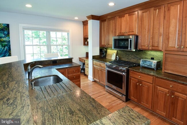 Building Photo - Discover exceptional comfort and timeless style in this beautifully updated single family residen...