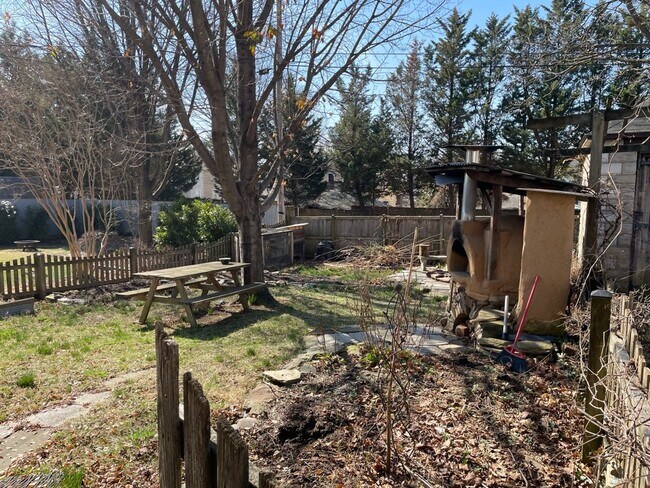 Building Photo - Lauraville 4-Bedroom, 2-Bathroom American Foursquare Home with Beautiful Outdoor Space