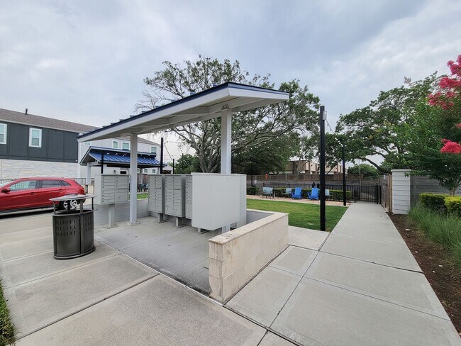 Building Photo - A true gem on a quiet corner lot, this spacious and sun-filled home is tucked away from street no...