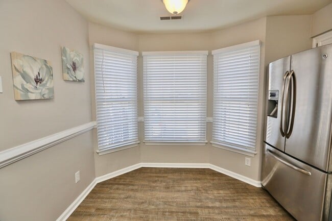 Building Photo - Updated End-Unit Brick Townhome Ready NOW!...