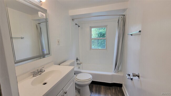 Building Photo - 8720 Marcella Ave