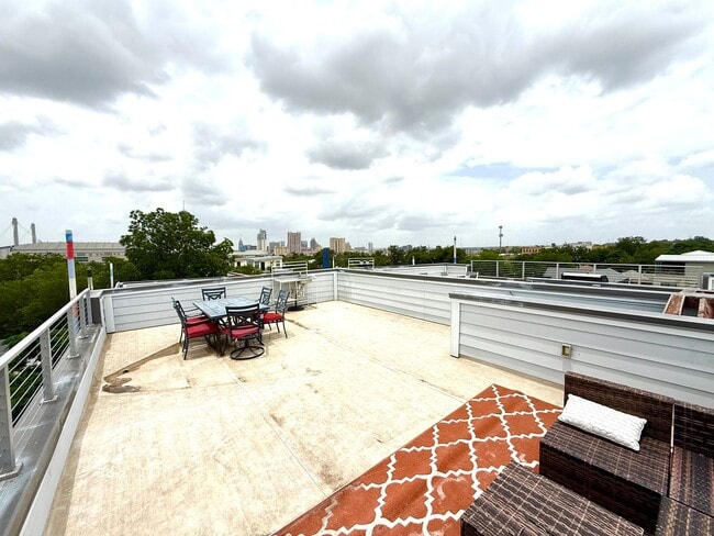 Building Photo - AVAILABLE NOW! Jaw Dropping 3 Story 3 Bedr...