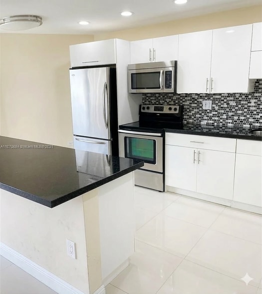 Building Photo - 7135 Collins Ave