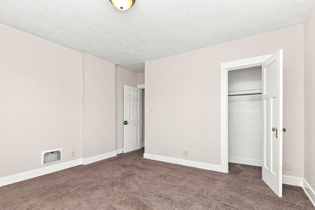 Building Photo - 1512-1514 S Smithville Rd