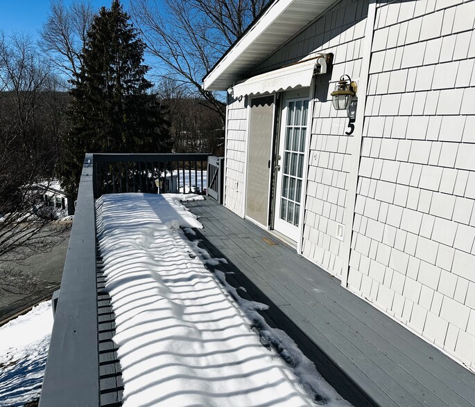 Front deck w/new Trex decking (not shown here) and retractable awning - 5 Greenwich Dr