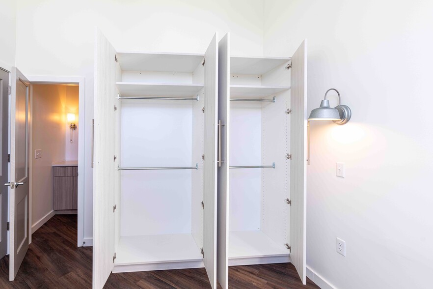 BR wardrobe with doors open. - 818 12th St