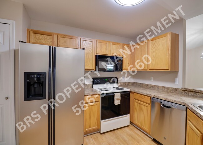 Building Photo - Clinton Township 2 bedroom 2 bath Condo