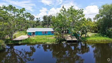 Building Photo - 2-Bedroom Oasis with Stunning River Views