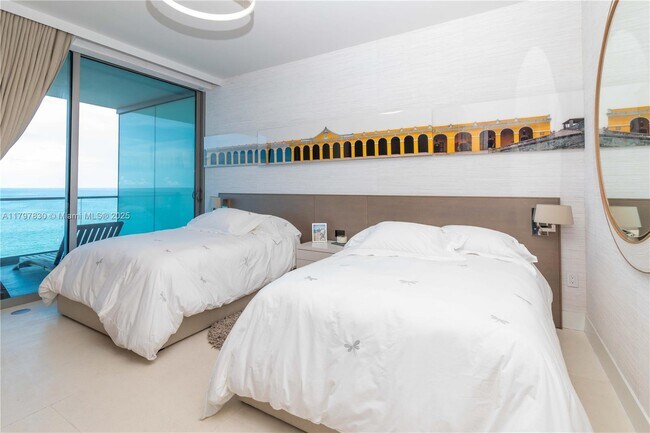 Building Photo - 10201 Collins Ave
