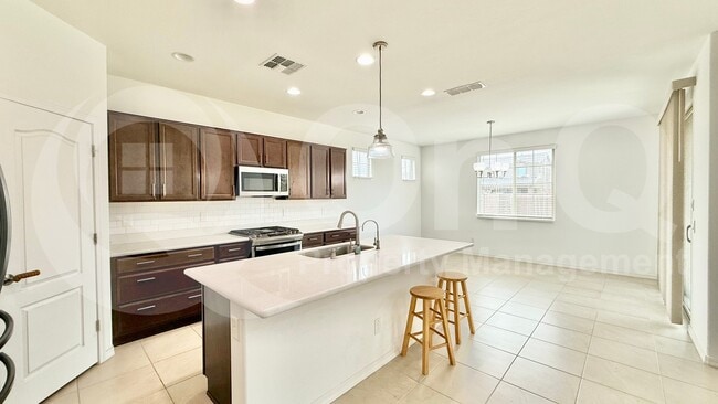 Building Photo - 10935 E Tesla Ave