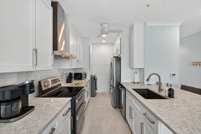 Building Photo - Completely Renovated Waterfront Condo – Fully Furnished