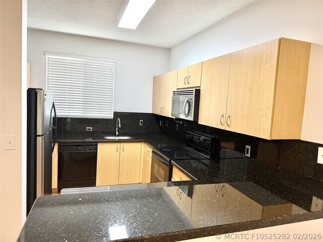 Building Photo - 4854 NW 58th Manor