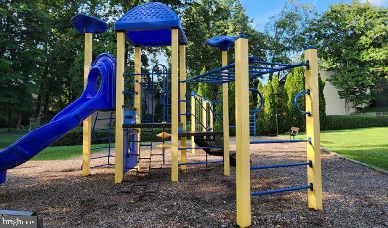 Community playground - 4965 Americana Dr
