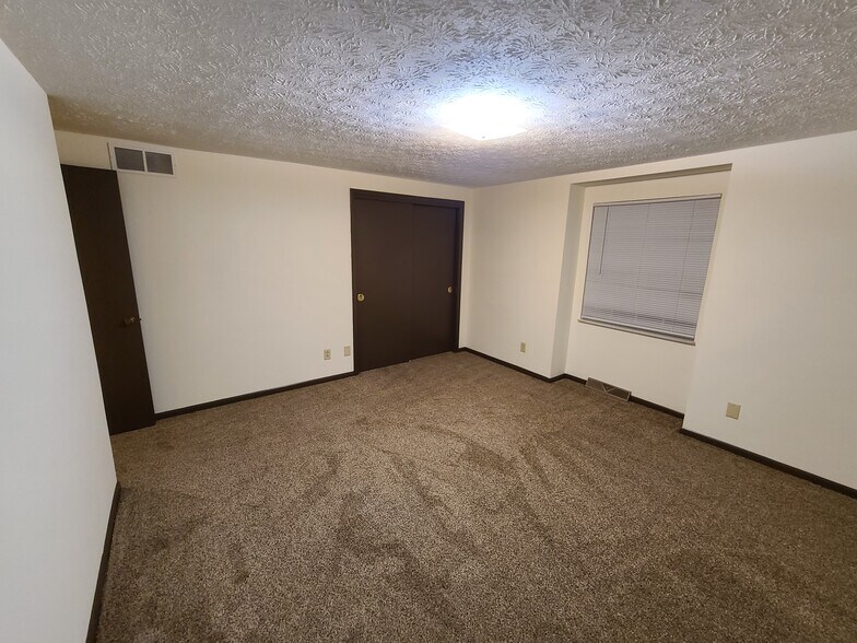 Bedroom One - 209 Whittier Dr S