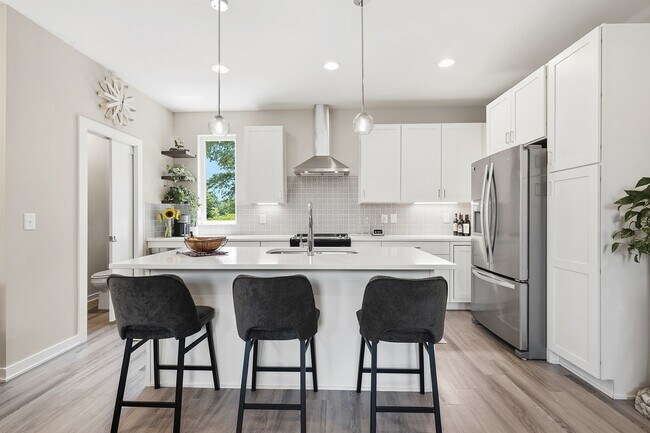 Building Photo - Live Elevated in Downtown Raleigh – Stunning Townhome with Rooftop Oasis!