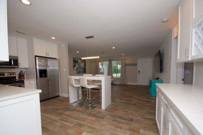 Building Photo - Step Into Sunshine: Modern Charm Meets Coa...