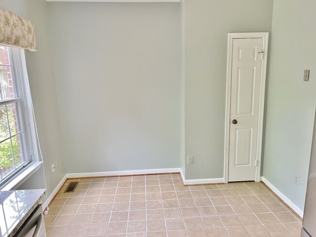 Building Photo - Updated, all brick 3 level townhouse pet friendly townhouse for rent!