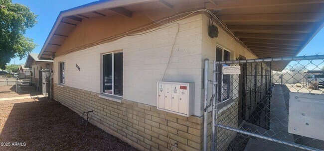 Building Photo - 8322 N 60th Ave