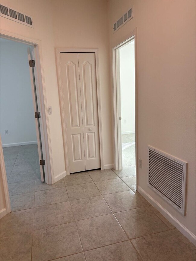 Building Photo - Like New 3 bedroom + den with French doors, screened in porch and Fenced yard and much more...