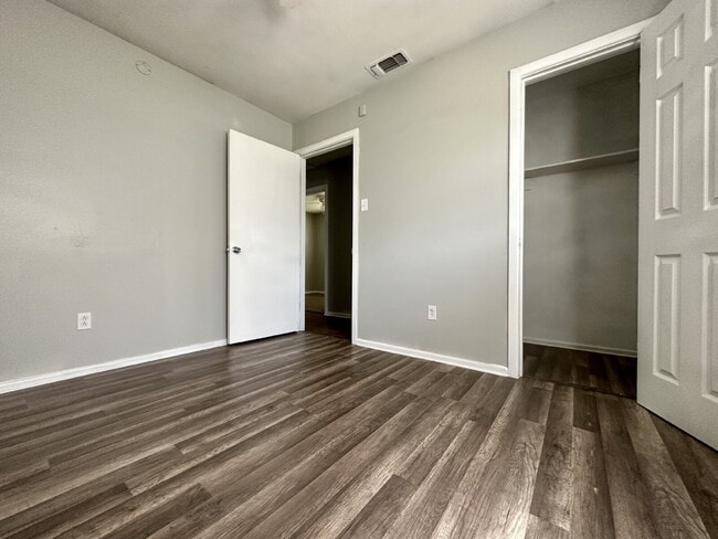 Building Photo - Updated Home with Gorgeous Floors & Large Backyard