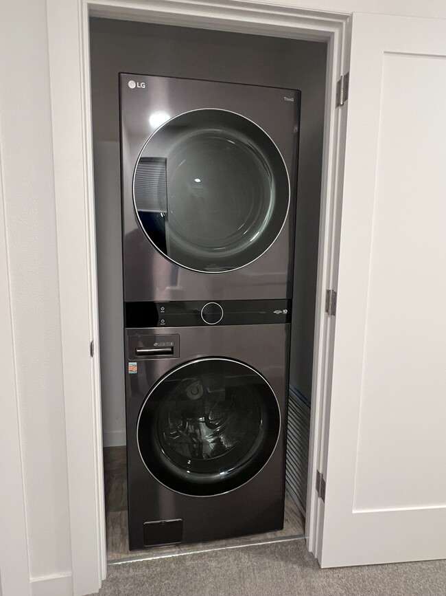 Stacked washer and dryer unit - 6175 Blue River Dr SE