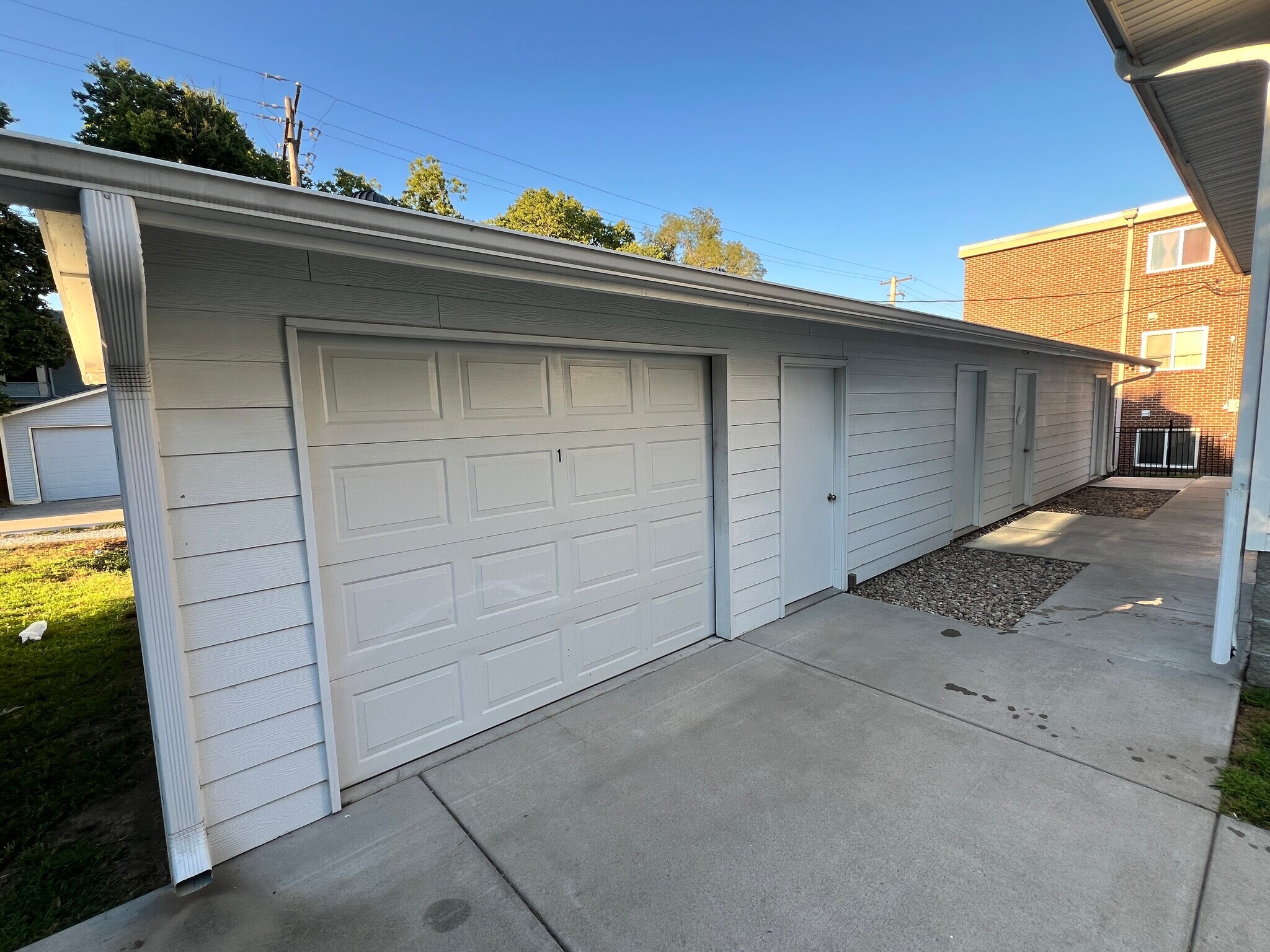 Secured garage with electricity and opener - 3260 Starr St