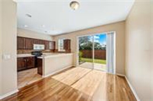 Building Photo - Luxury Lake Nona Townhome in Gated Community | 3BR + Garage + Resort-Style Amenities