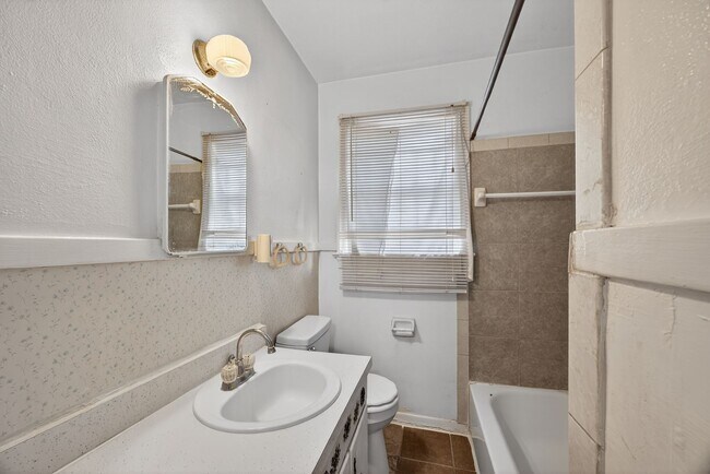 Building Photo - Spacious 3-Bedroom Corner Home with Garage & Private Courtyard