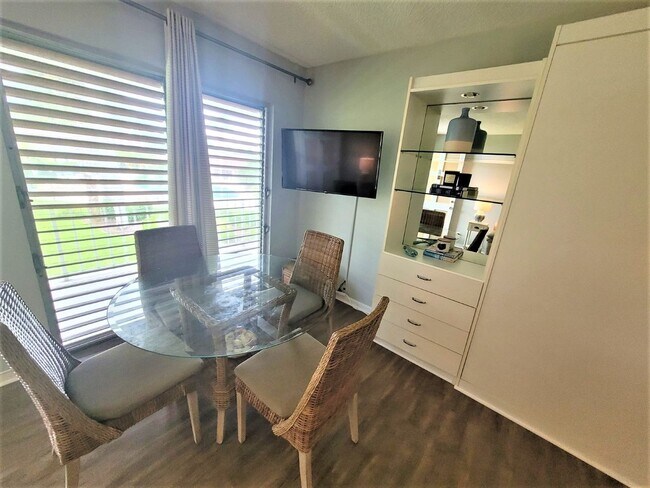 Building Photo - Renovated Efficiency Unit at Aquarius of M...